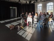 Photo: An artist conversation happening in one of Dance4's studios at their international centre for choreography. credit: Matthew Cawrey